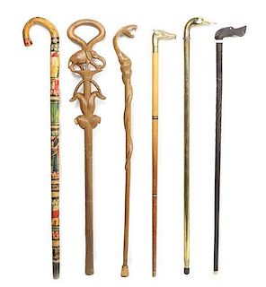 A Collection of Six Walking Sticks, Length of longest 36 1/4 inches.