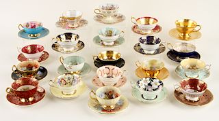 21 HAND PAINTED PORCELAIN TEA CUPS AND SAUCERS