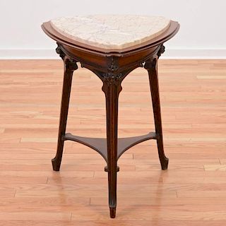Art Nouveau walnut table attributed to Majorelle