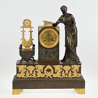 Empire gilt and patinated bronze mantel clock