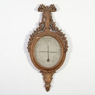 Louis XVI giltwood wheel barometer