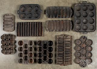 Collection of cast iron food molds.