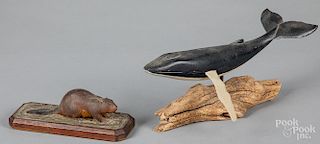 Carved and painted humpback whale and beaver