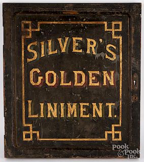 Painted Silver's Golden Liniment cabinet door