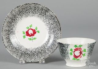 Black spatter cup and saucer