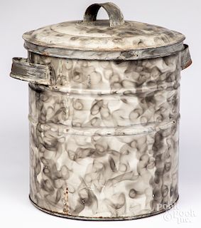 Smoke decorated tin canister