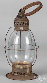 Tin and blown glass lantern