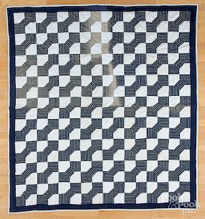 Two contemporary pieced quilts.