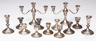 Group of weighted sterling silver candlesticks