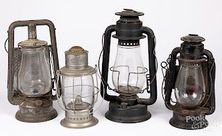 Four tin lanterns.