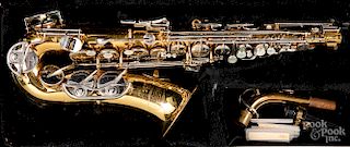 Cased Selmer Bundy II saxophone.