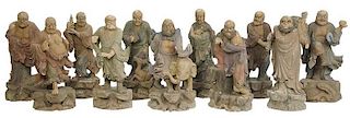 11 Carved Wood and Polychrome Buddhist Deities