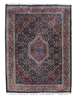 An Indo-Persian Carpet, Dimensions of first 7 feet 9 inches x 5 feet 6 inches.