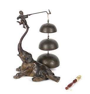A Set of Three Chinese Bronze Graduated Chimes on Stand, Height 11 1/2 inches.