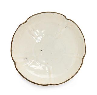 A Ding- Type White Glazed Porcelain Floriform Plate Diameter 5 inches.