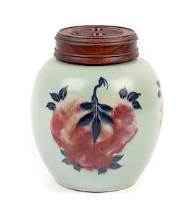 A Copper Red and Underglaze Blue Porcelain Ginger Jar Height 8 inches.