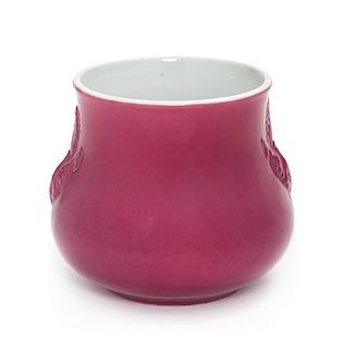 * A Pink Glazed Porcelain Jar Height 3 1/2 inches.