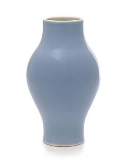A Claire-de-Lune Glazed Olive-Shaped Porcelain Vase Height 6 inches.