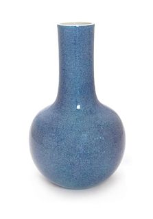A Robin's Egg Glazed Porcelain Bottle Vase Height 8 1/4 inches.
