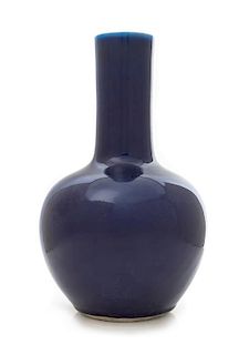 A Blue Glazed Porcelain Bottle Vase Height 13 1/4 inches.