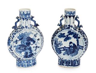 A Pair of Blue and White Porcelain Moon Flasks Height of each 8 1/4 inches.