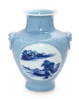 * A Claire-de-Lune Ground Underglaze Blue Porcelain Zun Vase Height 10 inches.