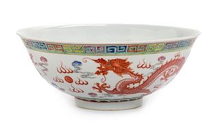 * An Iron Red Decorated Famille Rose Porcelain 'Dragon and Phoenix' Bowl Diameter 7 1/4 inches.