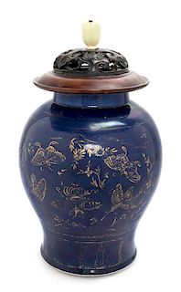 A Gilt Decorated Blue Glazed Porcelain Covered Jar Height 17 inches.