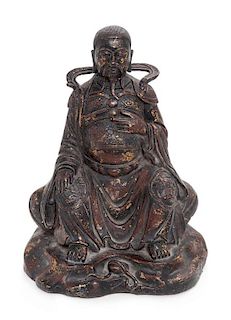 A Gilt Lacquered Bronze Figure of a Daoist Immortal, Zhen Wu Height 10 inches.