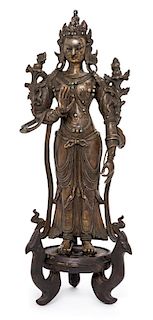 A Sino-Tibetan Bronze Figure of Avalokiteshvara Height overall 15 inches.