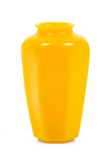 * A Small Yellow Glass Hexagonal Bottle Height 4 inches.