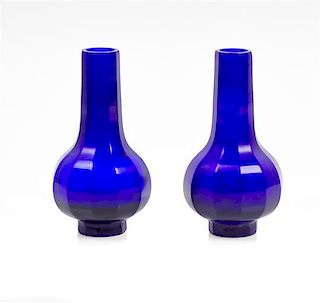 * A Pair of Cobalt-Blue Glass Faceted Bottle Vases Height 6 inches.