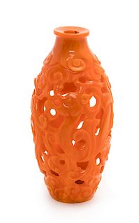 * A Small Realgar Glass Openwork Chilong Bottle Height 5 1/4 inches.