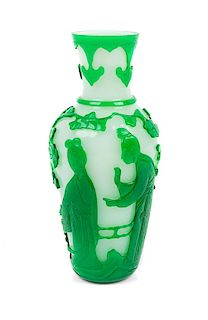 * A Green Overlay White Peking Glass Bottle Vase Height 7 3/4 inches.