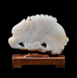 * A White Jade Figure of Dragon Fish Height 4 inches.