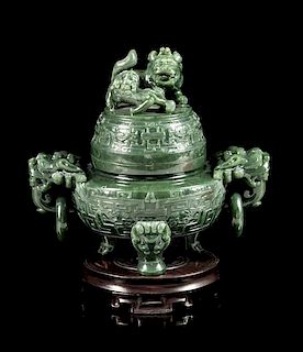 * A Spinach Jade Tripod Censer Height 7 inches.