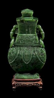 * A Spinach Jade Covered Vase, Height 7 1/4 inches.