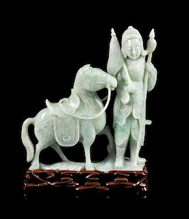 * A Green Jadeite Figural Group of a Warrior and a Horse Height 8 3/4 inches.