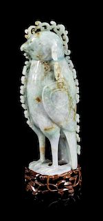 * A Jadeite Phoenix-Form Covered Vessel Height 5 3/4 inches.