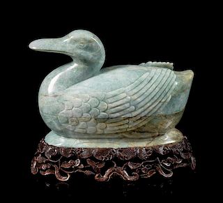 * A Green Jadeite Duck-Form Covered Box Height 5 1/4 inches.