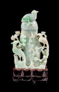* An Apple Green and Celadon Jadeite Covered Vase Height 9 3/8 inches.