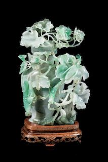 * An Apple Green and Celadon Jadeite Covered Vase Height 6 3/4 inches.