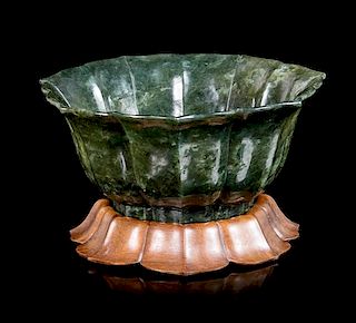 A Spinach Jade Bowl Height 3 x diameter 7 inches.