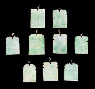 * Nine Apple Green and Celadon Jadeite Plaques Length of largest 1 3/4 inches.