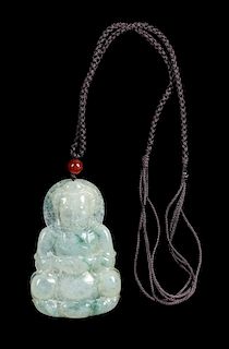 A Jadeite Buddha Pendant Length 2 3/4 inches.