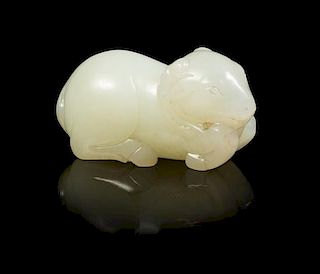 A Pale Celadon Jade Figure of a Ram Length 2 1/2 inches.