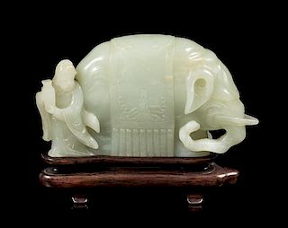 A Celadon Jade Figural Group of an Elephant and an Immortal Length 5 3/4 inches.