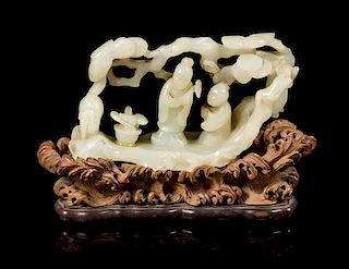 A White Jade Figural Group Length 5 1/2 inches.