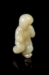 A Celadon Jade Figure of a Boy Height 2 7/8 inches.