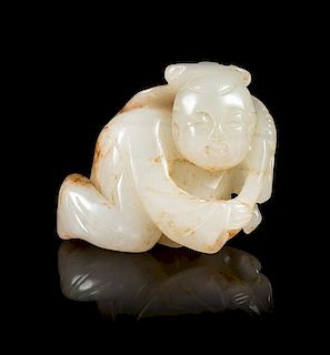 A White and Russet Jade Figure of a Boy Height 1 1/4 inches.